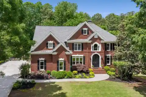 Traditional-style Masterpiece in Prestigious Falls of Autry Mill