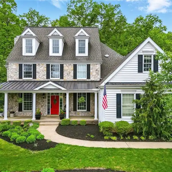 CUSTOM RESIDENCE IN DESIRABLE FIELD LAKE ESTATES