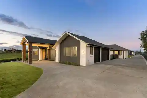 North-Facing Brick Estate with Triple Garage