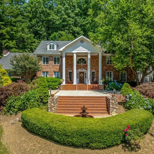 MULTI-GENERATIONAL OASIS ON TWO WOODED ACRES