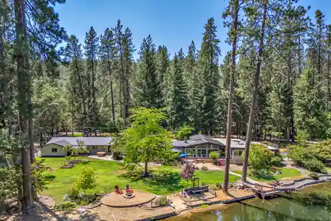Single Level Estate Bordering a Private Lake