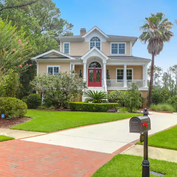 PRIVATE GATED HOME OVERLOOKING TRANQUIL POND
