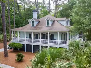 Discover Coastal Living at Its Finest in This Stunning 3,883 Square Foot Home Located in the Exclusive Haig Point Community.