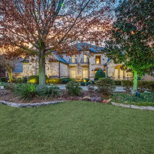 CUSTOM HOME BY AWARD WINNING BUILDER ON 1/2 ACRE CREEK LOT IN GATED NEIGHBORHOOD