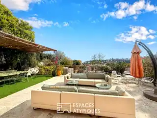 Contemporary Gem with Solarium and Garden Views