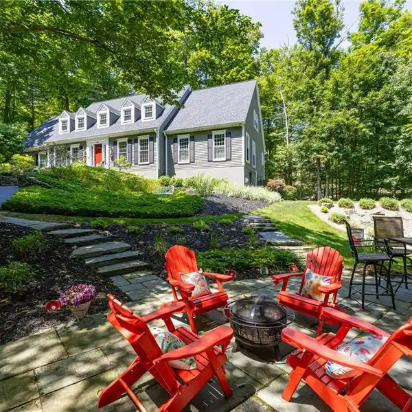 CHARMING NEW ENGLAND CAPE ON A GORGEOUS LOT