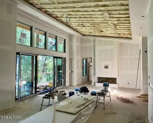 ENERGY-EFFICIENT HOME BACKING TO NATURAL SPRING