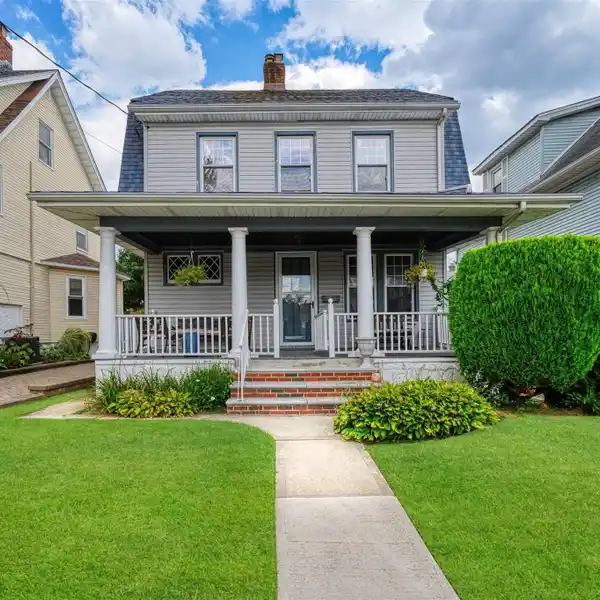 CHARMING DUTCH COLONIAL REVIVAL HOME