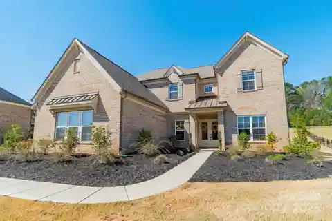 Modern Brick Estate on Expansive Wooded Acreage