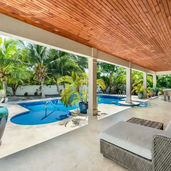 PRIVATE OASIS WITH MODERN ELEGANCE AND POOLSIDE LUXURY