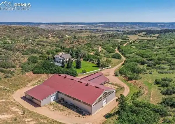 SOPHISTICATED RANCH HOME WITH CUSTOM ARENA AND BARNDOMINIUM