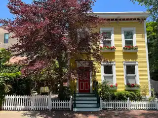 Iconic 1875 Old Town Yellow House