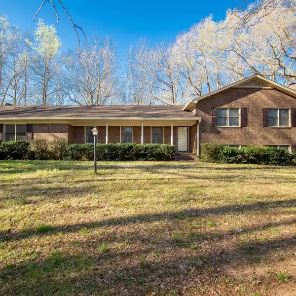 LOVELY BRICK HOME ON OVER 23 ACRES