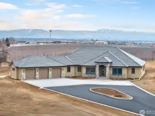 Modern Luxury on over Three Acres in a Gated Community