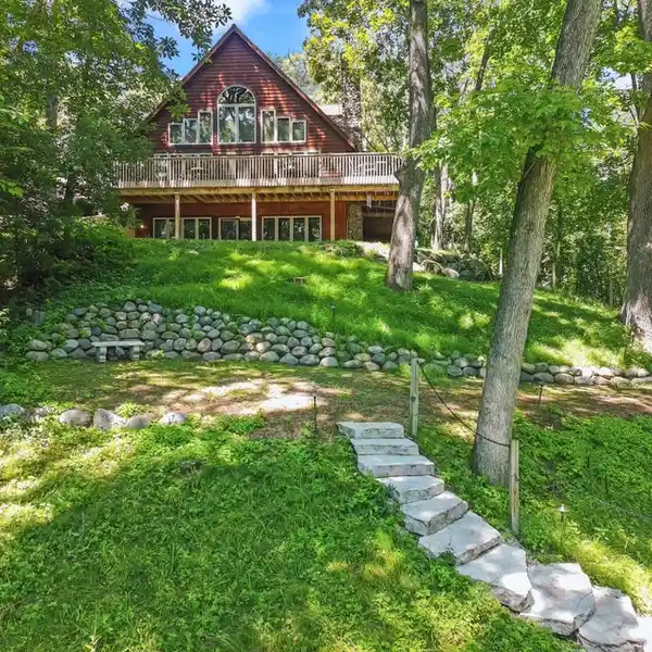 BEAUTIFUL CHALET STYLE HOME ON OVER 5.5 ACRES