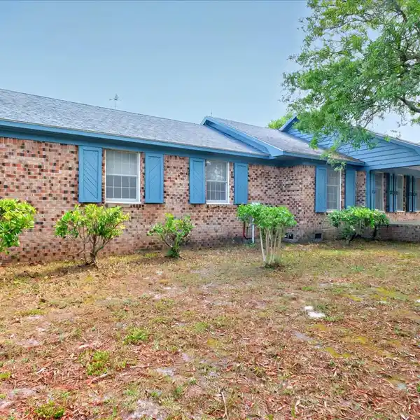 A RARE INTRACOASTAL OFFERING — ICONIC OAK ISLAND ESTATE ON TWO EXPANSIVE WATERFRONT LOTS