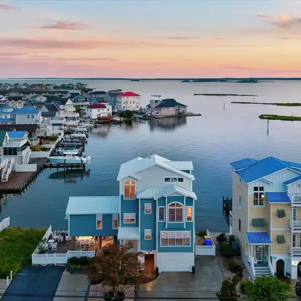 UNMATCHED WATERFRONT LIVING ON DESIRABLE RAINBOW ROW
