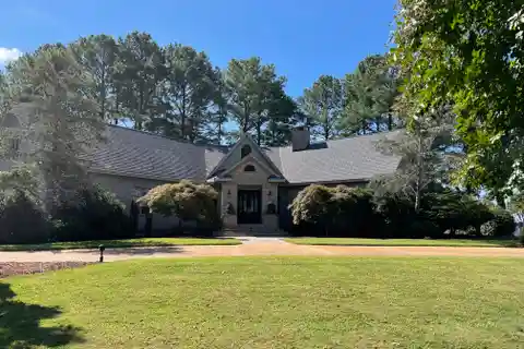 Exclusive Riverfront Estate with Versatile Design