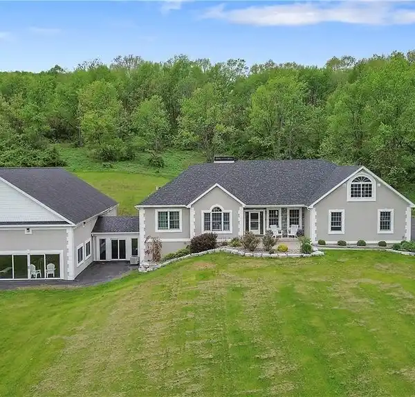 SPACIOUS FIVE BEDROOM RANCH ON OVER 40 ACRES