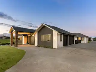 North-Facing Brick Estate with Triple Garage
