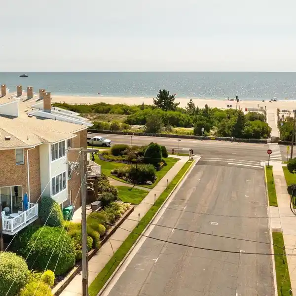 RARE BEACHFRONT CORNER TOWNHOME