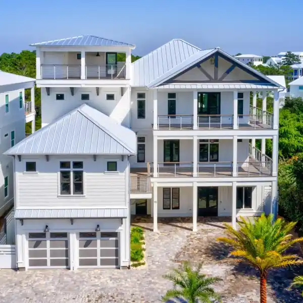 FOUR-STORY BEACH HOUSE WITH CARRIAGE WALKOVER