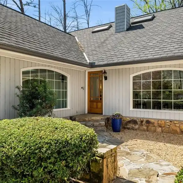 EUROPEAN-STYLE HOME WITH NEWER POOL