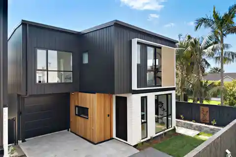 Cedar-Clad Sophistication with Sunlit Garden Escape