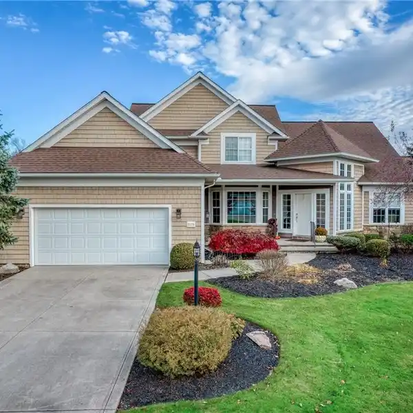 STUNNING TRANSITIONAL HOME WITH STRIKING ARCHITECTURAL SOPHISTICATION