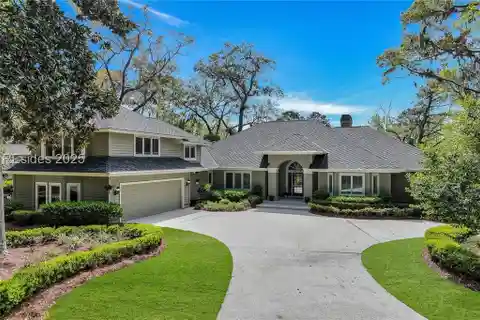 Updated Residence with Sweeping Fairway and Lagoon Views
