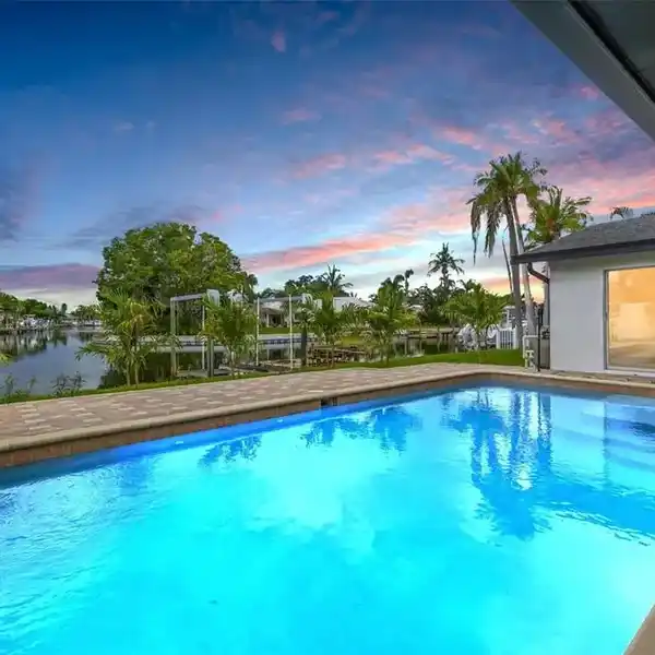 MAGNIFICENT MOVE-IN READY WATERFRONT POOL HOME