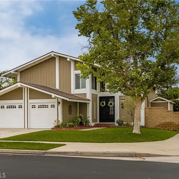 BEAUTIFULLY MAINTAINED HOME ON A PRIME CORNER LOT