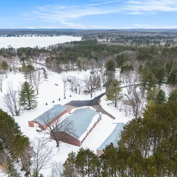 WELL-MAINTAINED RANCH HOME PLUS EXPANSIVE STORAGE BARNS ON NEARLY SIX ACRES
