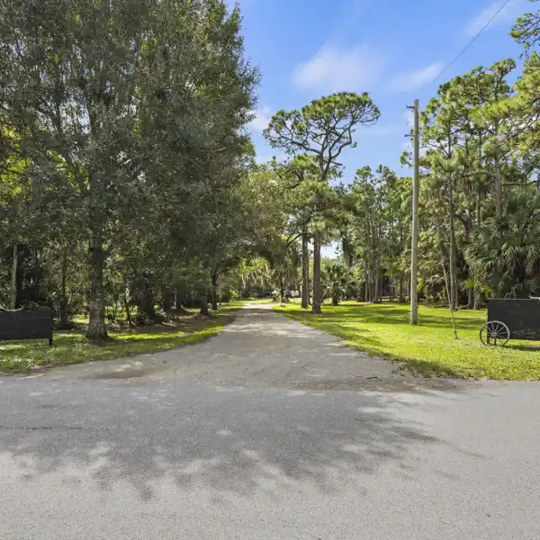 PALM CITY GEM – RENOVATED HOME ON PRIVATE LOT