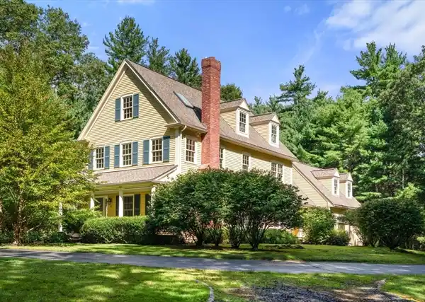 CUSTOM COLONIAL WITH PICTURESQUE SETTING AND PRIVACY