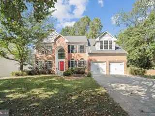 Beautifully Updated Brick-Front Colonial