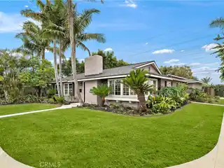 Single-Level Stunner with Tropical Backyard Oasis