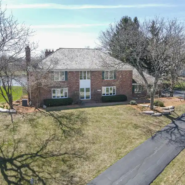 STUNNING ALL-BRICK LAKEFRONT HOME