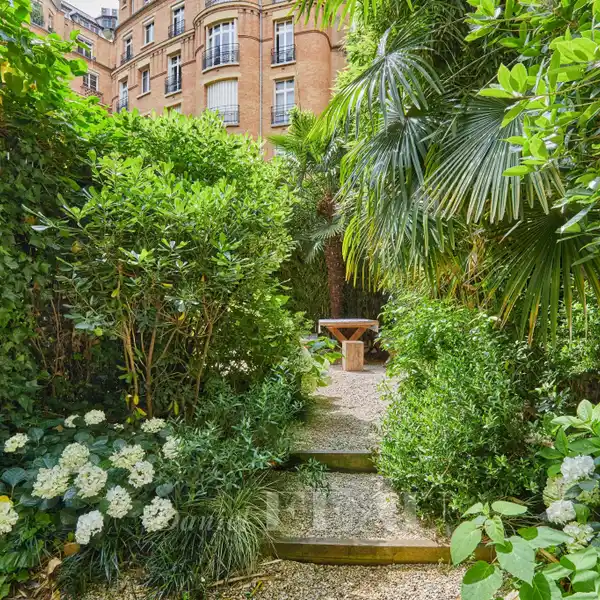 EXCEPTIONAL GARDEN-LEVEL APARTMENT