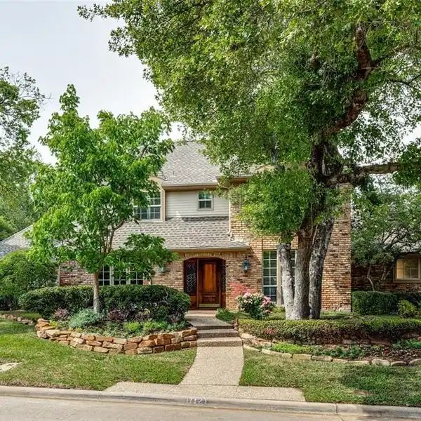 BEAUTIFULLY MAINTAINED HOME EXUDING CHARACTER