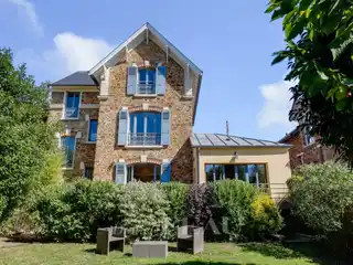 Early 20th-Century Millstone and Brick House