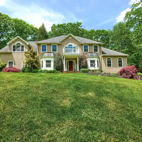 ELEGANT COLONIAL IN THE DESIRABLE TIMBER TRAILS COMMUNITY