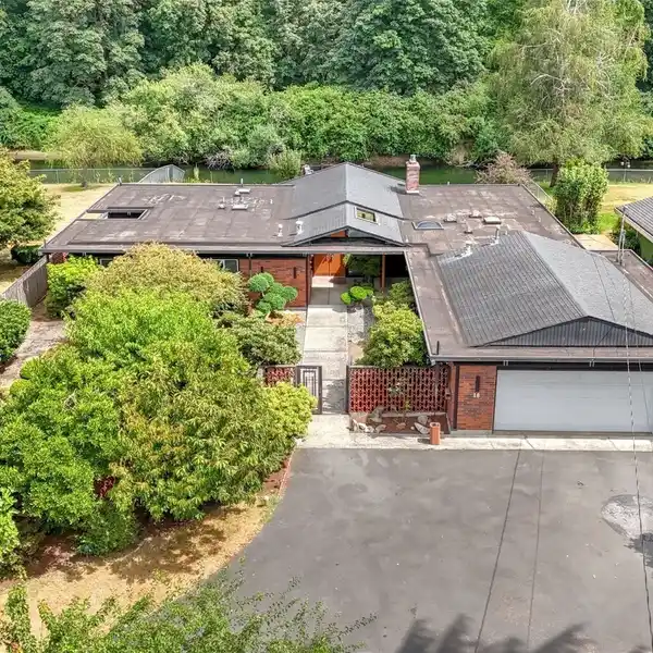 RIVERFRONT MID-CENTURY GEM WITH TIMELESS STYLE