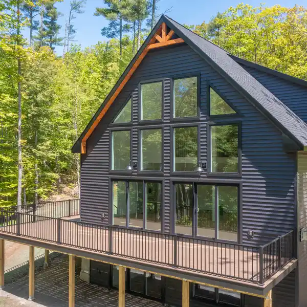 CUSTOM-BUILT HOME WITH SEASONAL LAKE VIEWS