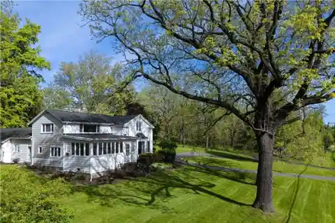 Charming Farmhouse on Expansive Private Lakefront
