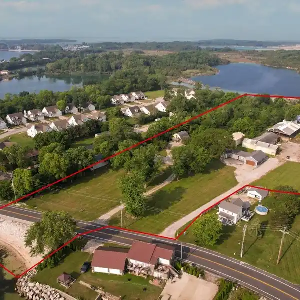 NEARLY SEVEN LAKEFRONT ACRES