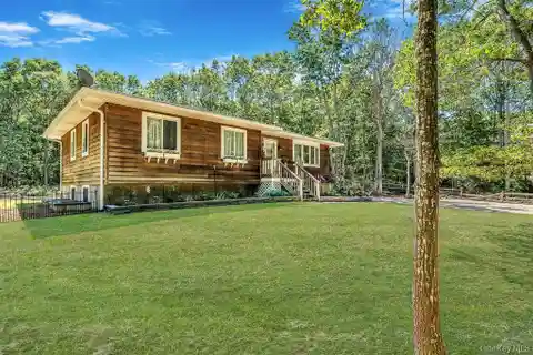 Hampton Bays Raised Ranch on Expansive Parcel