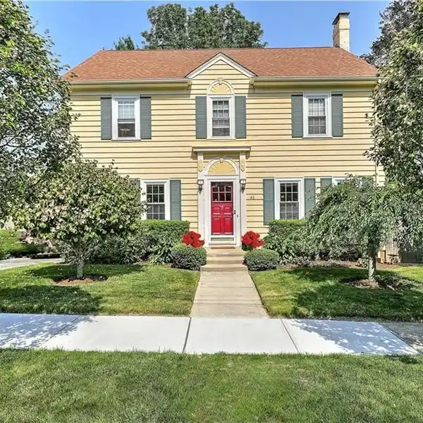 BEAUTIFULLY MAINTAINED CENTER-HALL COLONIAL