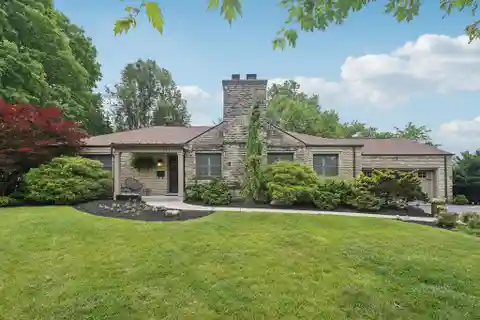 Custom Stone Mid-century Modern Ranch in Riverlea