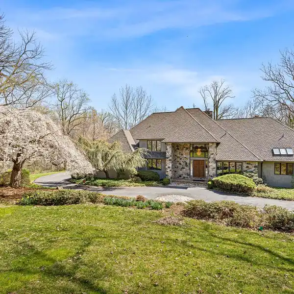 CUSTOM STONE CONTEMPORARY WITH STUNNING NATURE VIEWS